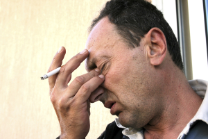 Crying man with cigarette
